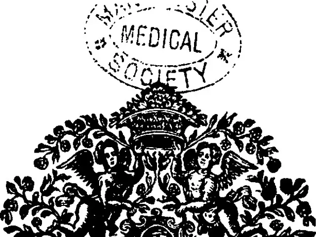 The image shows a black and white drawing of a medical society logo with text written on it. The...