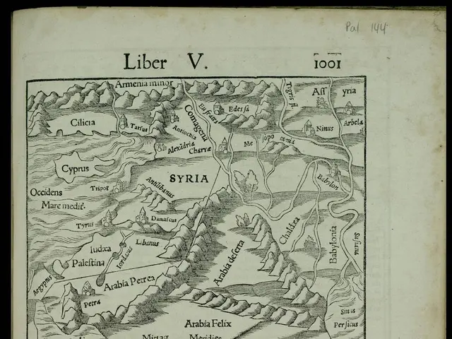 The image shows an old book with a black background and a map of Syria on it. The map is detailed...