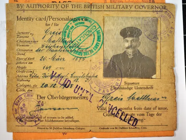 The image shows an old passport with a picture of a man in uniform on it, along with some text and...
