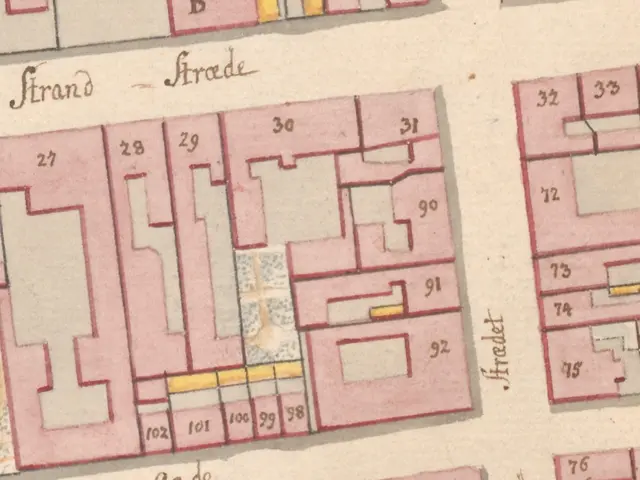 The image shows an old map of a city with a lot of buildings, which is believed to be a plan of the...