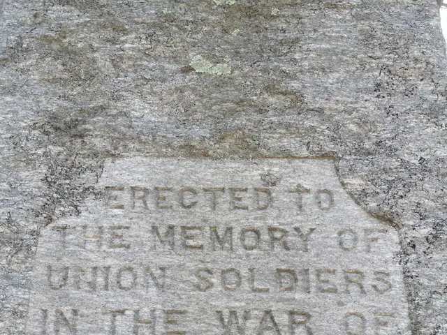 The image shows a stone with a plaque on it that reads "The Memory of Union Soldiers in the War of...