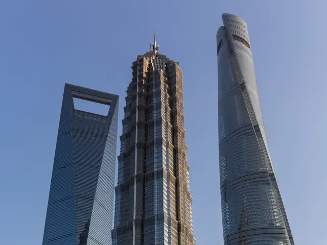 The image shows the Shanghai World Financial Center, with its towering skyscrapers surrounded by...
